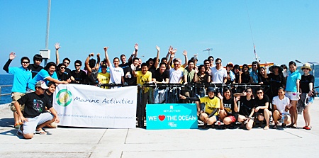 A select group of sponsors and public officials assembled on Koh Larn for a coral-planting exercise.