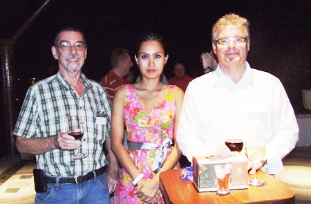 (L to R) Herman van Gucht, director of Town & Country Property; Ann; and Louis J. Van den Berghm, CEO of 4A Properties.