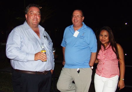 (L to R) Kevin Fisher, manager of the Far East Region of Cranes and Equipment Ltd.; John Clarke, chief executive officer of Forbears Freedom Wealth Management Co., Ltd.; and Miss Rujira Phatham.