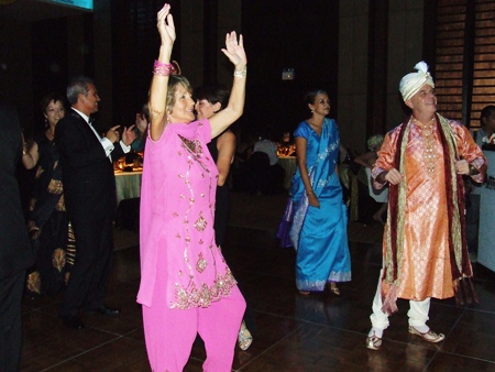 Party goers show off their costumes on the dance floor.