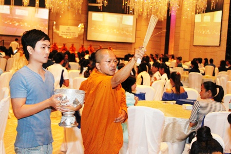 Harald Feurstein, general manager of Hilton Pattaya, led staff in performing a Buddhist merit-making ceremony with nine monks blessing the hotel and its staff.