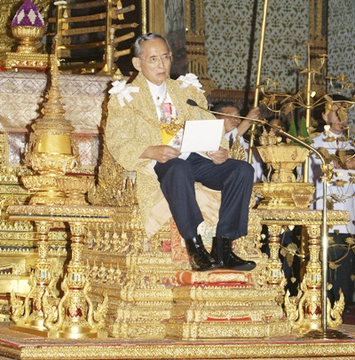 HM King Bhumibol Adulyadej reads a statement during a ceremony on his 82nd birthday celebration at the Borombhimarn Throne in Bangkok, Saturday, Dec. 5, 2009. On Wednesday, May 5, 2010, the Kingdom marked the 60th anniversary of the Coronation of His Majesty King Bhumibol Adulyadej the Great.