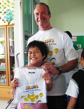 Taptim after being presented with a shirt from us.