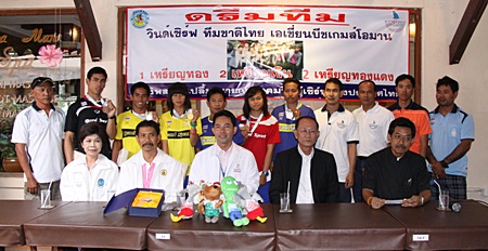Pattaya mayor Ittipol Khunploem, seated center, and members of the Windsurf Association of Thailand, welcome back the successful sailors from the 2010 Asian Beach Games in Singapore.