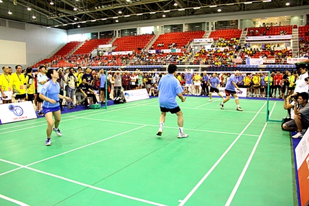 Badminton players take part in the 17th World Chinese Badminton Championships at the Eastern National Sports Center in Pattaya on Friday, November 19.
