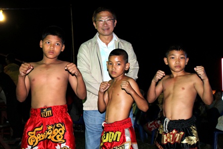 The three young boxing stars strike a pose.