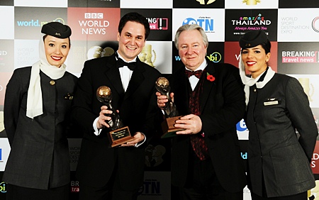 Peter Baumgartner (left), Etihad’s chief commercial officer, celebrates winning the title for “World’s Leading Airline” and “World’s Leading First Class” airline at the World Travel Awards, with Graham Cooke (right), president and founder, World Travel Awards, and Etihad cabin crew members. 