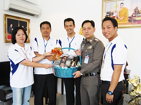 Pol. Col. Nanthawut Suwanla-ong (2nd right), superintendent of Pattaya City Police, welcomed the management team from the Hilton Pattaya who came by to wish him a happy New Year. (l-r) Napatsorn Narongin, human resources manager, Montree Sattham, director of human resources, Norrarat Suebprasong, security manager and Dhaninrat Klinhom, marketing & communications manager.