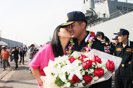 Above and below: Despite mixed fortunes at sea, the crew of the two vessels were guaranteed a warm welcome home from loved ones.