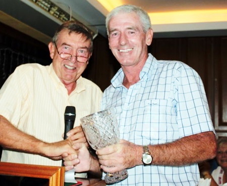 President’s Day runner-up Seamus Cotter, right, accepts his prize.