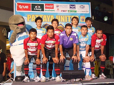 Players from the Pattaya United squad pose for a photo at a press conference held at Central Beach shopping mall on Friday, Feb. 4.