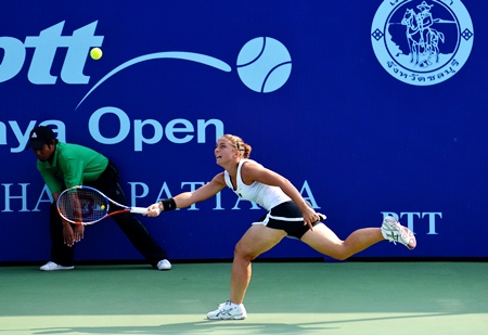 Errani scrambles to chase down a cross court forehand from Hantuchova.