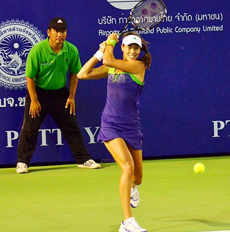 Serbia’s Ana Ivanovic returns the ball to Jill Craybas during her marathon match with the American that was interrupted by a power failure at the stadium.