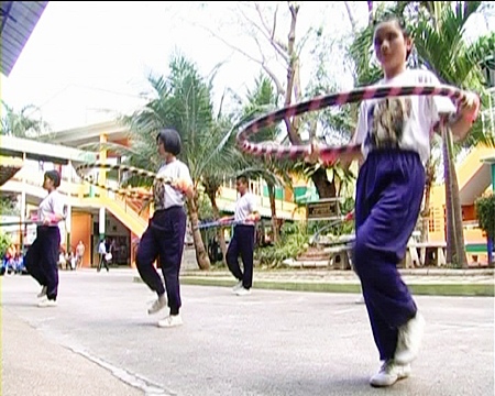 Young students from the Redemptorist School take part in the hula-hoop competition.
