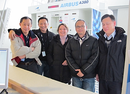 Thai Airways International Public Company Limited (THAI) sent pilots to receive training in Toulouse, France for a period of 5 weeks in preparation to operate Airbus A380 aircraft that will enter the fleet in 2012. Captain Noparat Yeesun (2nd right) led the pilot group in this training session, accompanied by Captain Nathaphong Lekhavat (1st right), Captain Chawan Ratanawaraha (2nd left), and Captain Thospol Bhurivatana (1st left), who attended 11 sessions and 44 hours of training from Airbus that includes theoretical study and simulator training.