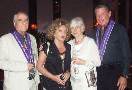 Members of the Chaine des Rotisseurs and guests enjoy cocktails in anticipation of the main event.