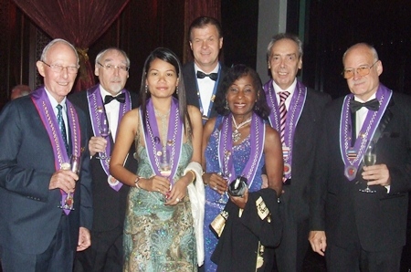 Members of the Chaine des Rotisseurs and guests enjoy cocktails in anticipation of the main event.