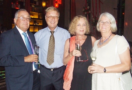 Members of the Chaine des Rotisseurs and guests enjoy cocktails in anticipation of the main event.