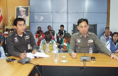 Pol. Lt. Purachet Ratnawichit (left), Pattaya Police Deputy Traffic Inspector, and Police Superintendent Lt. Col Nanthawut Suwanla-Ong (right), have enlisted the city’s motorbike taxi drivers to help them increase the use of helmets and report crime. 