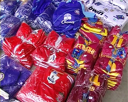 Officers found large quantities of counterfeit brand-name clothing items.