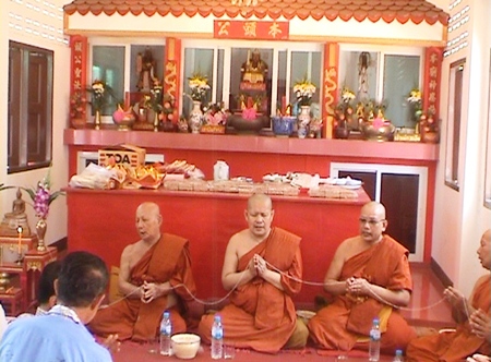 Buddhist monks attend the ceremony in Rong Poh as residents there prayed for prosperity and protection from the Sea God.