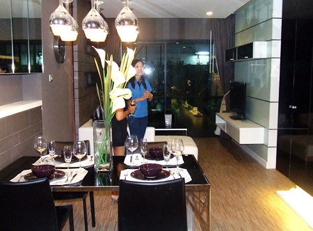 Party guests take a look around the glitzy project showroom.
