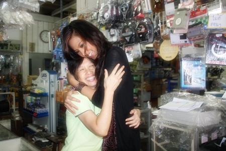 Chansorn gave her aunt, Patcharin Saisanit, a big hug, bringing the woman to tears.