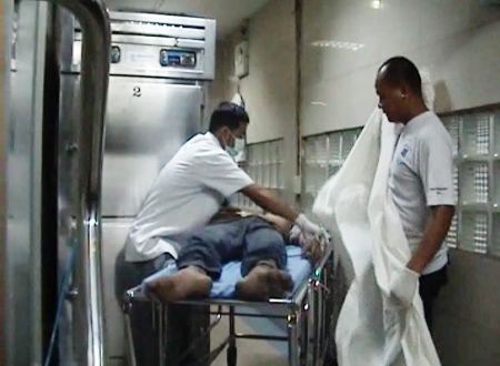 The drug dealing taxi driver is delivered to the morgue