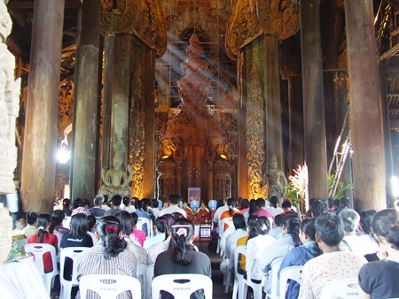 Buddhists and guests gather for religious ceremonies marking Visakha Bucha Day at the Sanctuary of Truth.