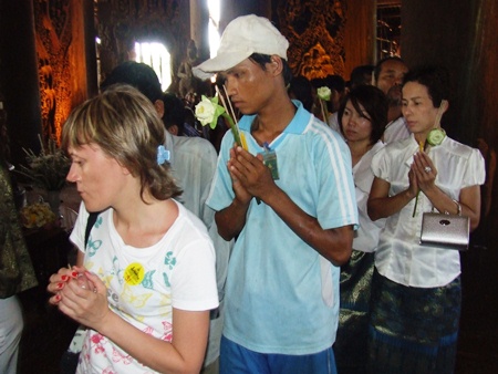 People perform the Wien Thien at the Sanctuary of Truth.