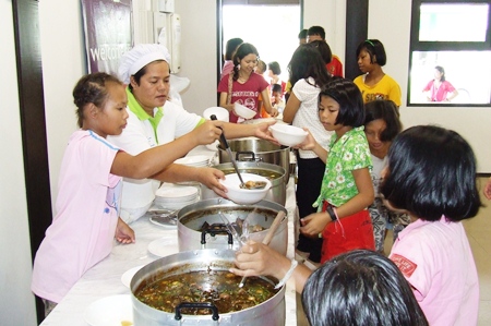 The Bridge Club of Thailand treats the orphans to lunch.
