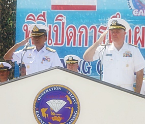 Adm. Chaiyos Sunthornnak (left), director of the Thai CARAT forces and chief of Frigate Squadron 2, and Rear Adm. Thomas Carney, commander of Task Force 73 preside over the CARAT opening ceremonies. 