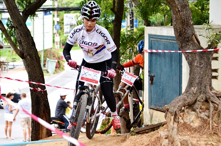 Mountain bikers negotiate the technical challenge of the cross country event.