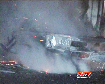 The smoldering remains of the truck