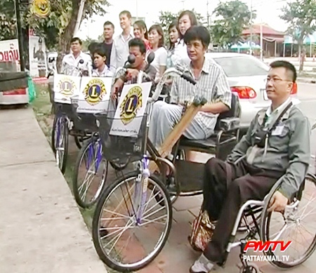 Four needy residents receive the new wheelchairs
