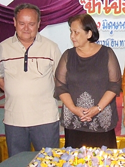 Pa Prem and his lovely wife Supanee prepare to blow out the candles on Prem’s birthday kanome. 