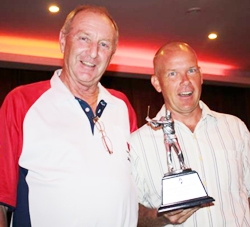 Low gross winner Jack Grinvold, right, with Lewiinski’s Golf Manager Colin.