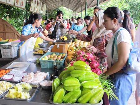 Buying fresh fruits and vegetables directly from the farmers.