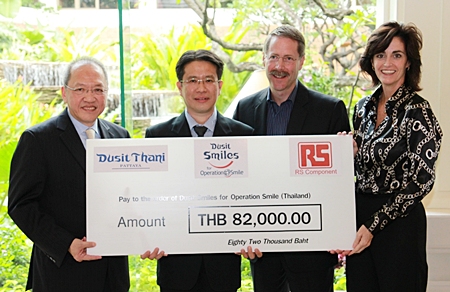 (L to R) Chatchawal Supachayanont, general manager of Dusit Thani Pattaya, Suthee Wetchapruekpitak of RS Components Company, Ltd., (Thailand), Kevin J. Beauvais, chairman of Operation Smile Thailand and Therese Beauvais, secretary of Operation Smile Thailand. 
