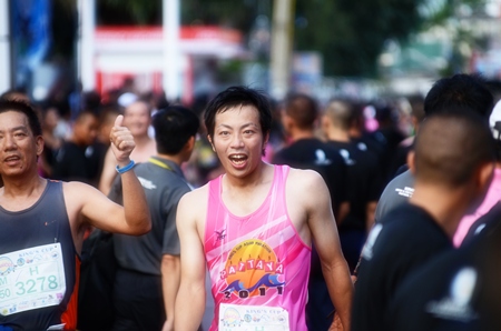 Runners savour the accomplishment of completing the half marathon.