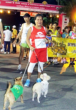 “Jae Ma” (Auntie Dog) takes her furry friends for their annual run.