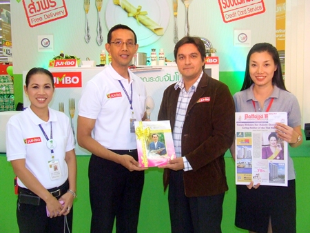 Marut Khutsumraan, store general manager Big C; Kamolthep Malhotra, general manager Pattaya Mail Publishing Co., Ltd.; and Supaporn Suwanphan, sales & marketing for Pattaya Mail Publishing Co., Ltd., at the grand opening.