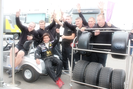 Sandy poses for a photo with his pit crew.