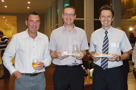 The snacks look yummy. (l-r) Paul Wilkinson (AustCham), Roger Wilson (Sales & Marketing Manager GKN Driveline) and David Wilkinson (MD Wood Group Heavy Industrial Turbines (Thailand) Ltd.)