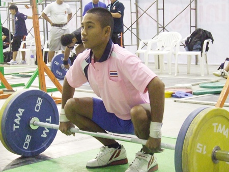 Thailand’s Sinphet Kruaithong warms up back stage before successfully competing in the 50kg Boys division.