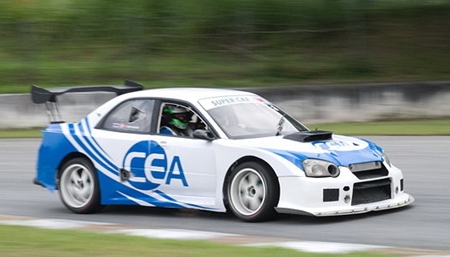 Thomas Raldorf thrills another passenger in the CEA Subaru. 