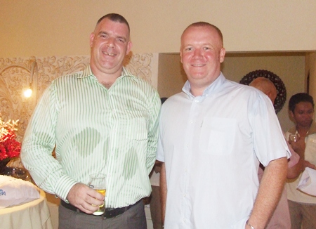 The ever familiar face of Joe Cox from Defense International Security Services with Earl Brown from the Sutlet Group.