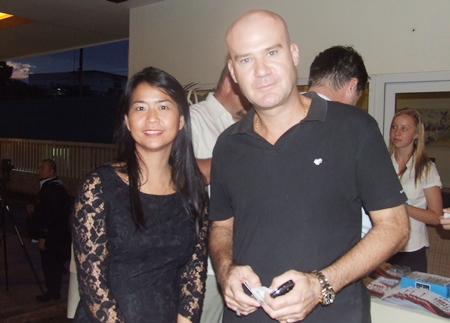 Chanita Thannikornget gets Stuart Daly to refrain from singing for a quick photo opportunity.