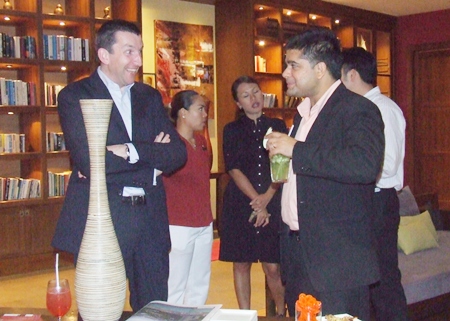 Michael Delargy (left) seems elated to see Tony Malhotra at the GM gang dinner.