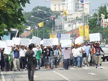 Koh Larn residents march to Pattaya City Hall to protest what they are saying is illegal development on their island.